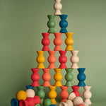 Chill Pepper Sweets Forest Fruits, gestapelde toren van houten snoepjes in bosvruchtenkleuren